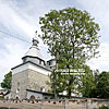  Church of Holy Trinity (16th cen.) with a wooden bell tower and defensive walls (19th cen.) 

